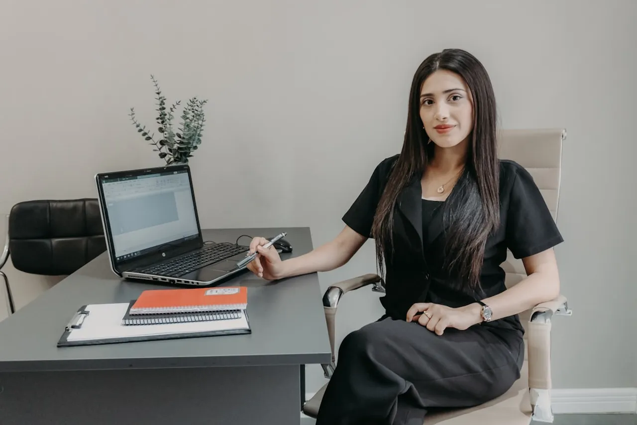 An employee working at her desk